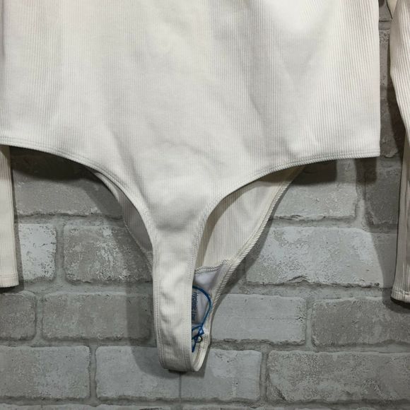 Ribbed Ivory Long Sleeve Henley Thong Bodysuit - Picture 11 of 11